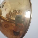 Golden hinged desk lamp