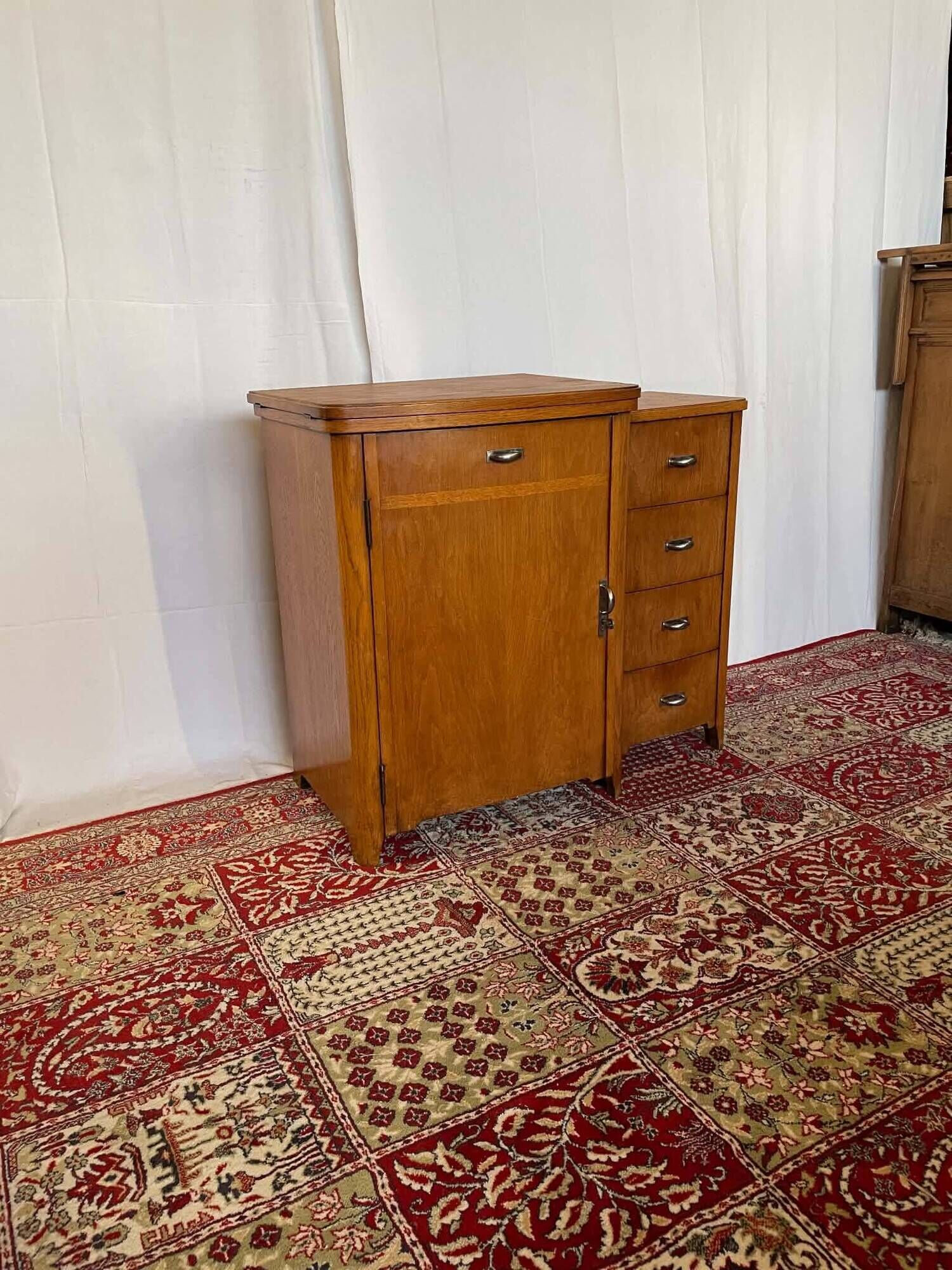 Old sewing cabinet with drawers