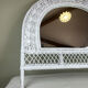 Half-moon wicker mirror