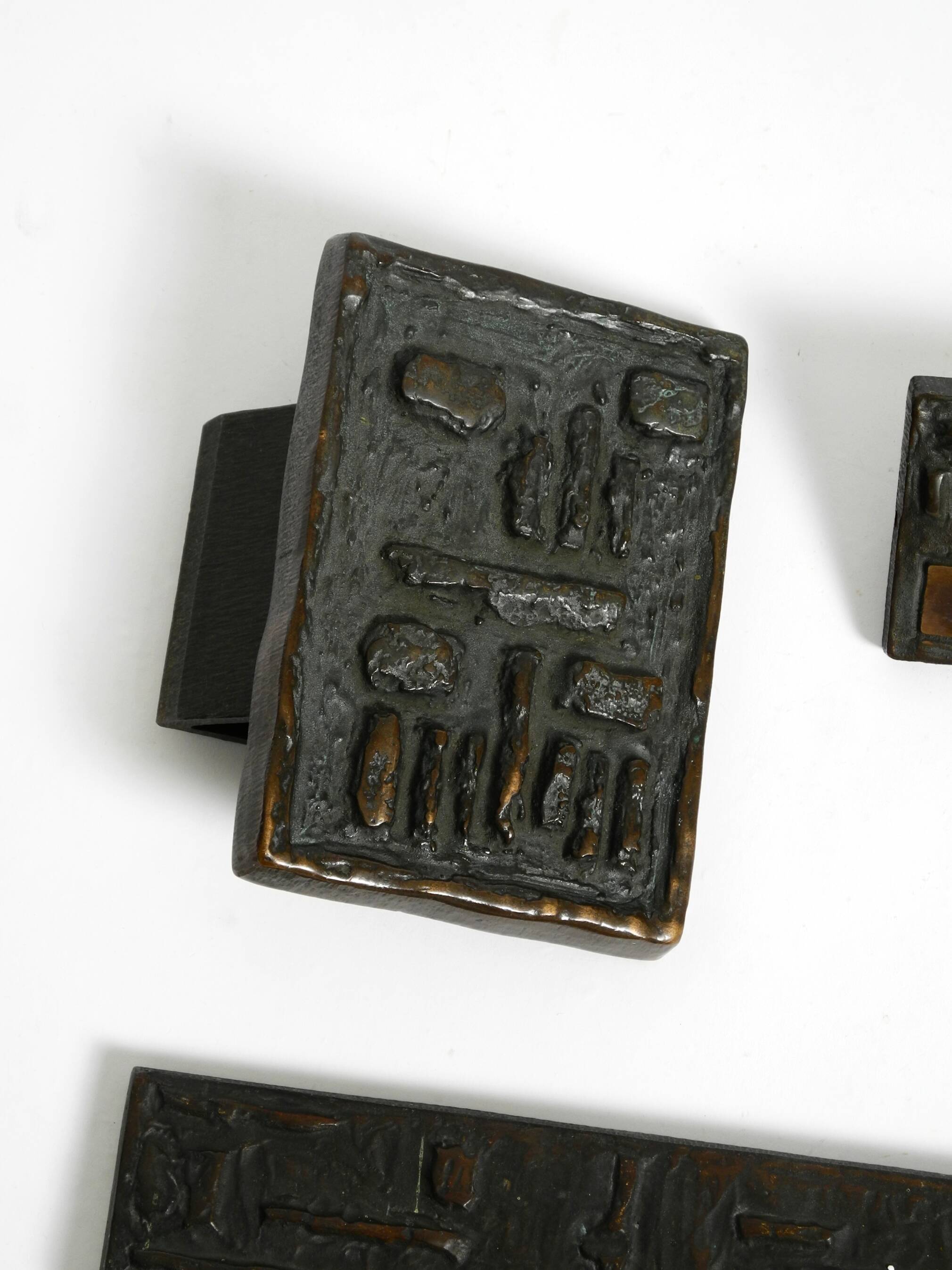 A set of solid 1970s Brutalist pull handles with letter slot and doorbell