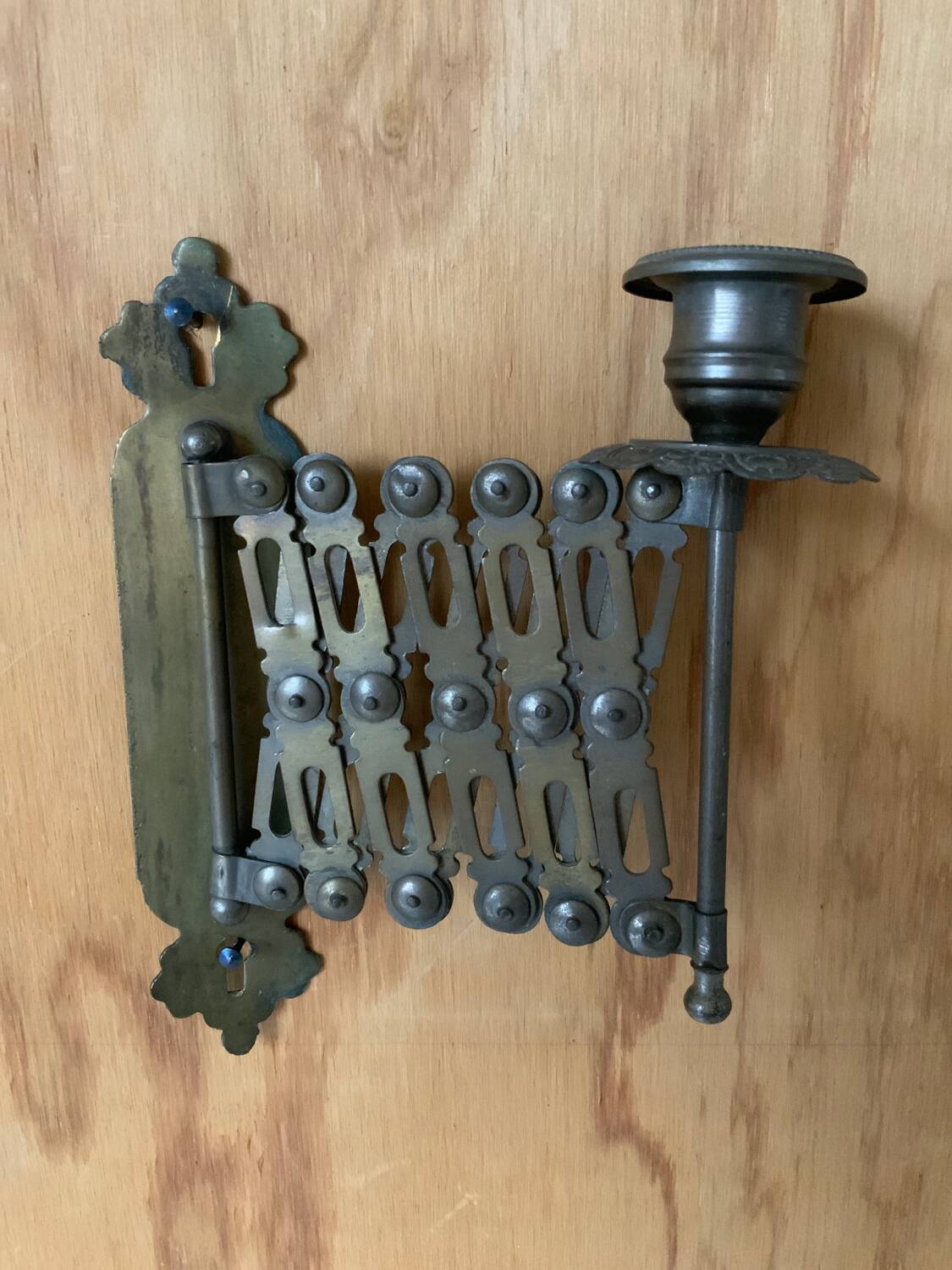 Accordion brass candle holder