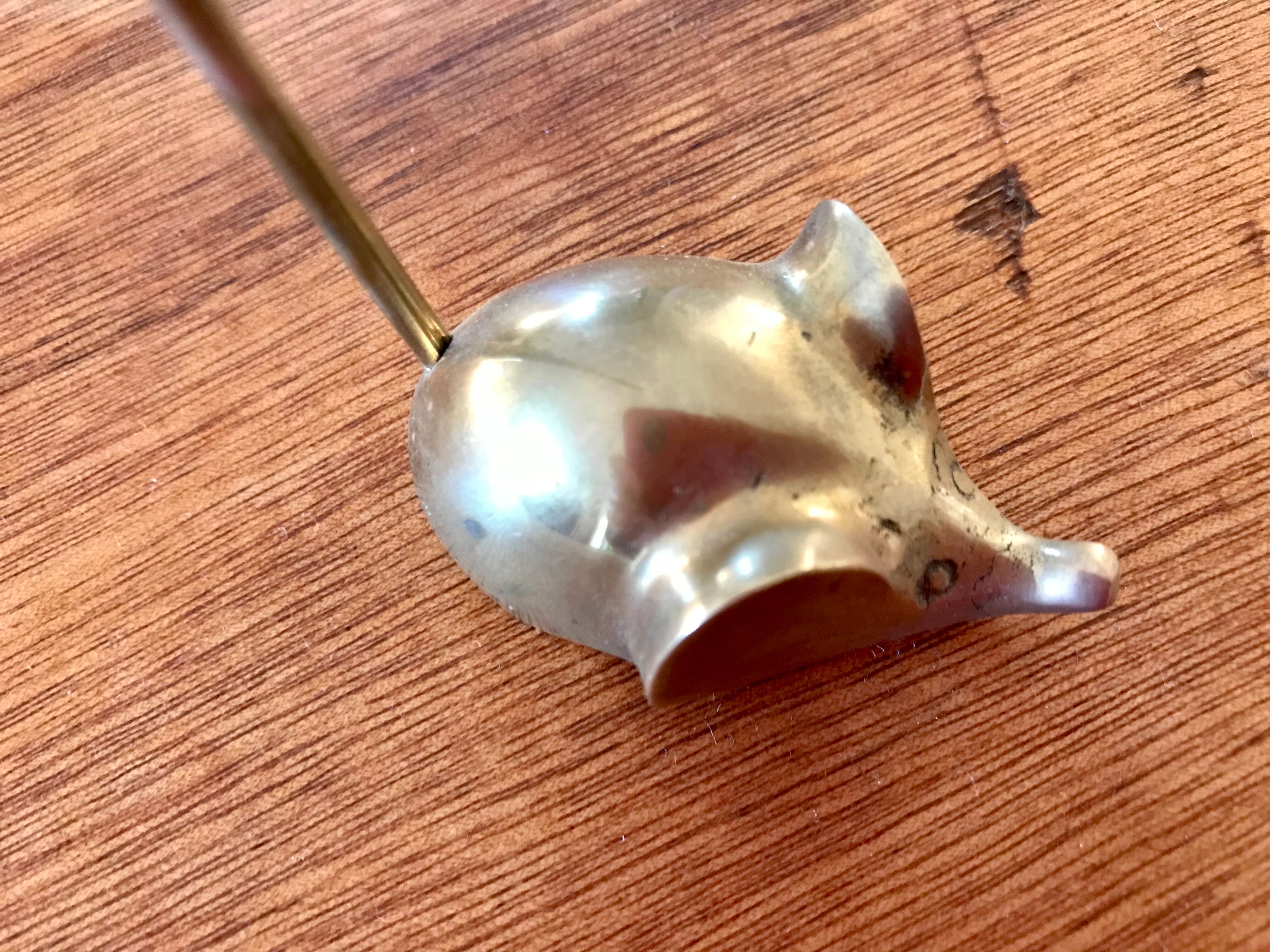 Mouse brass