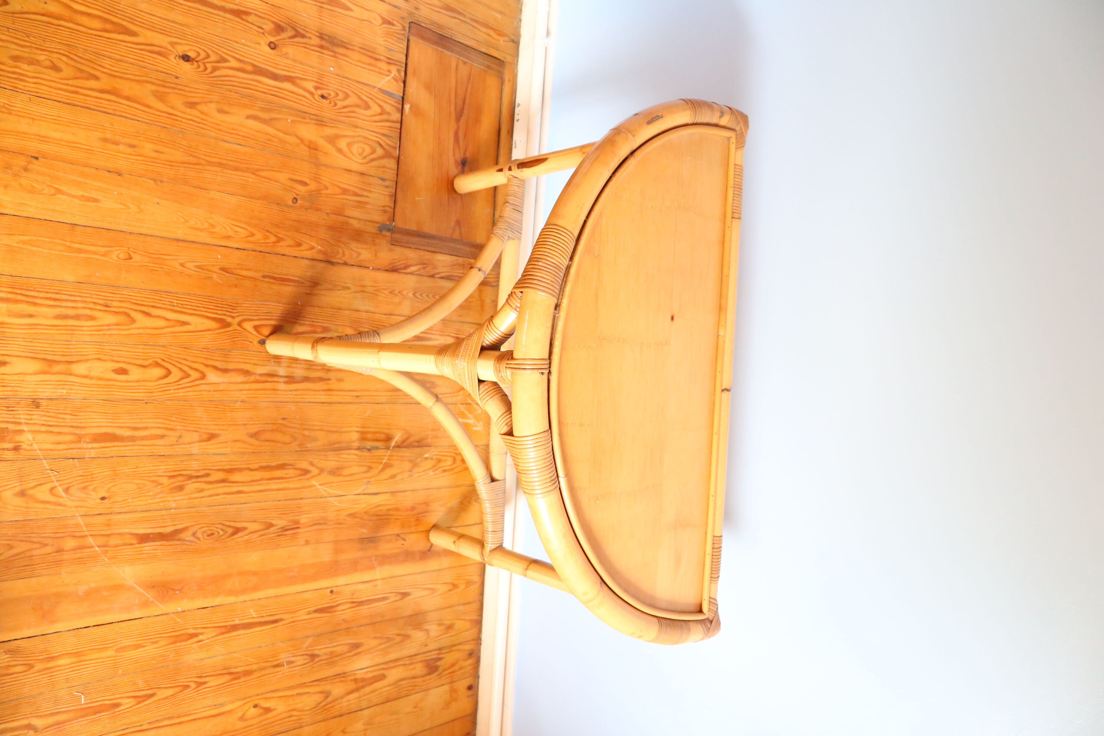 Half-moon rattan console