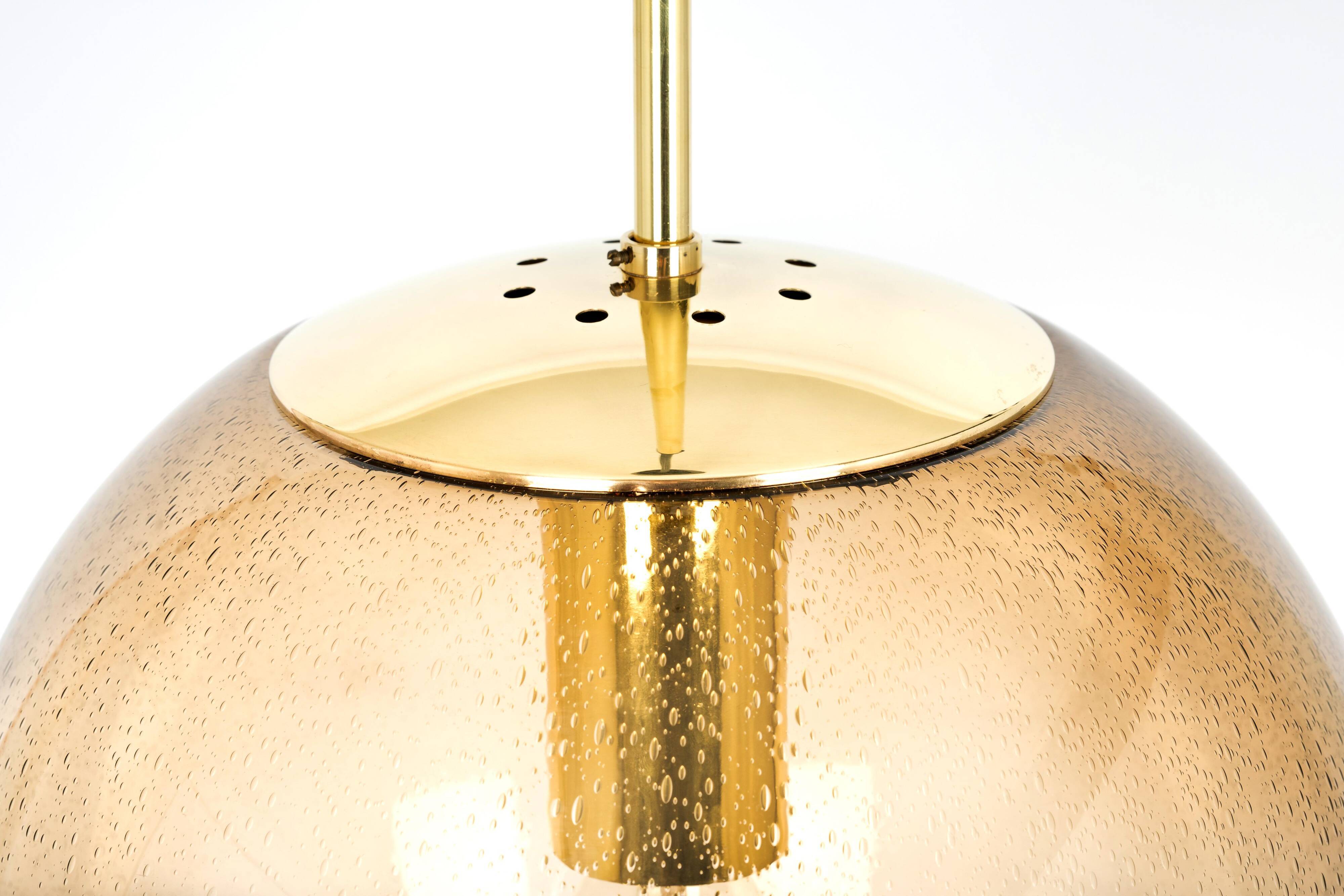 Smoked glass and brass ball pendant light Limburg, Germany, 1970s
