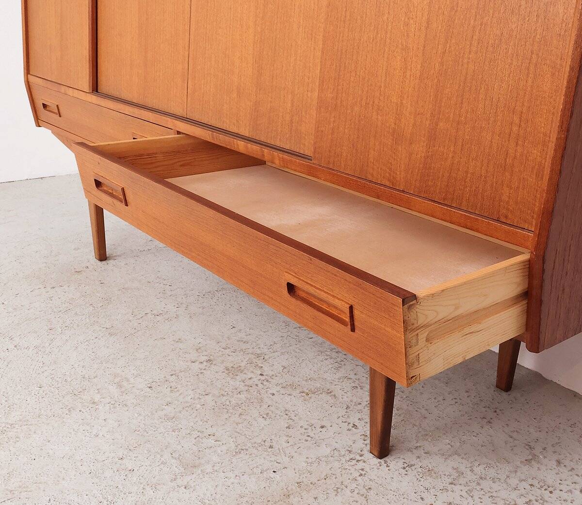 Teak highboard with sliding doors from Westergaard, 1960s