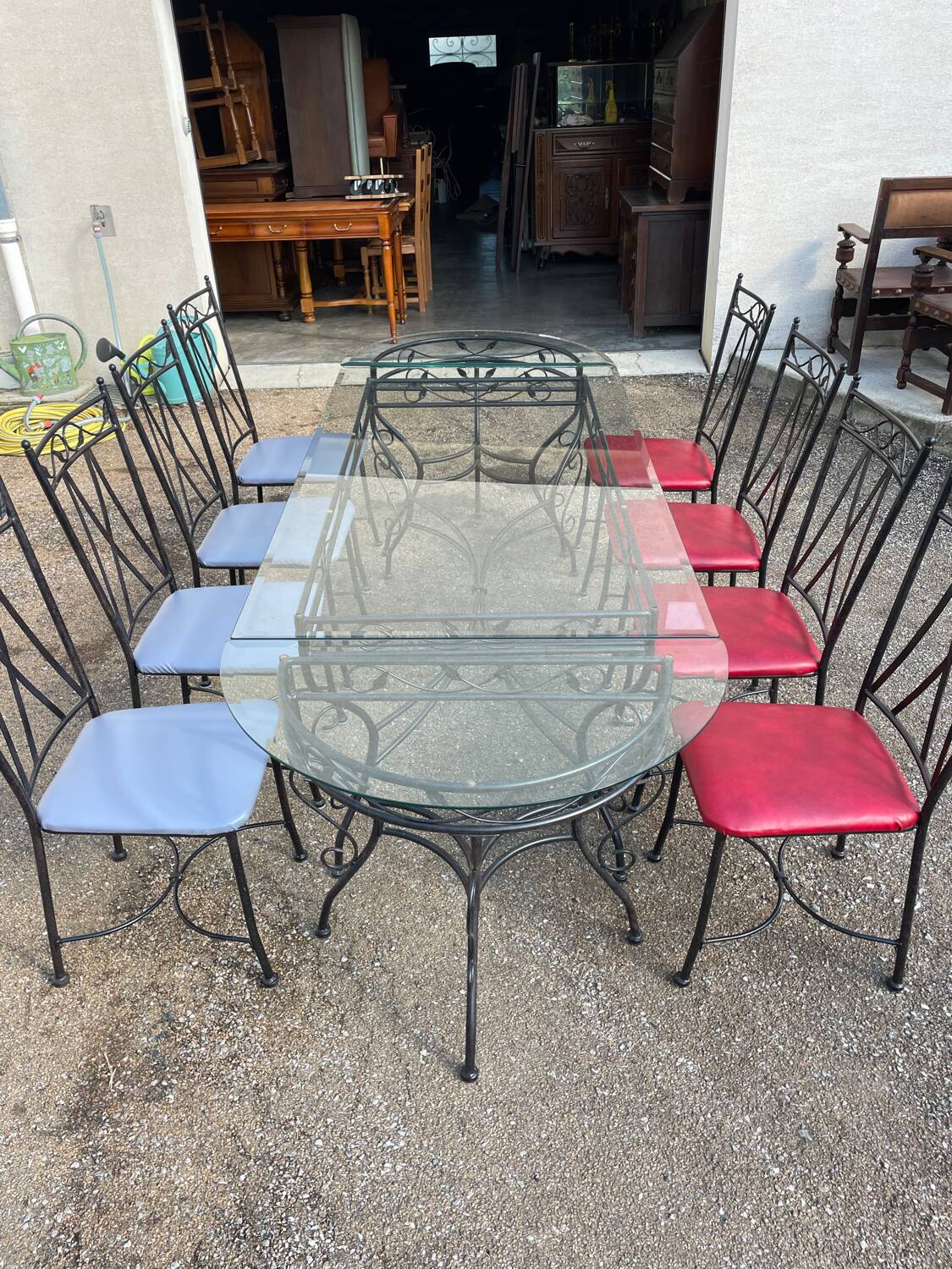 Glass and iron table with two side tables and 8 chairs