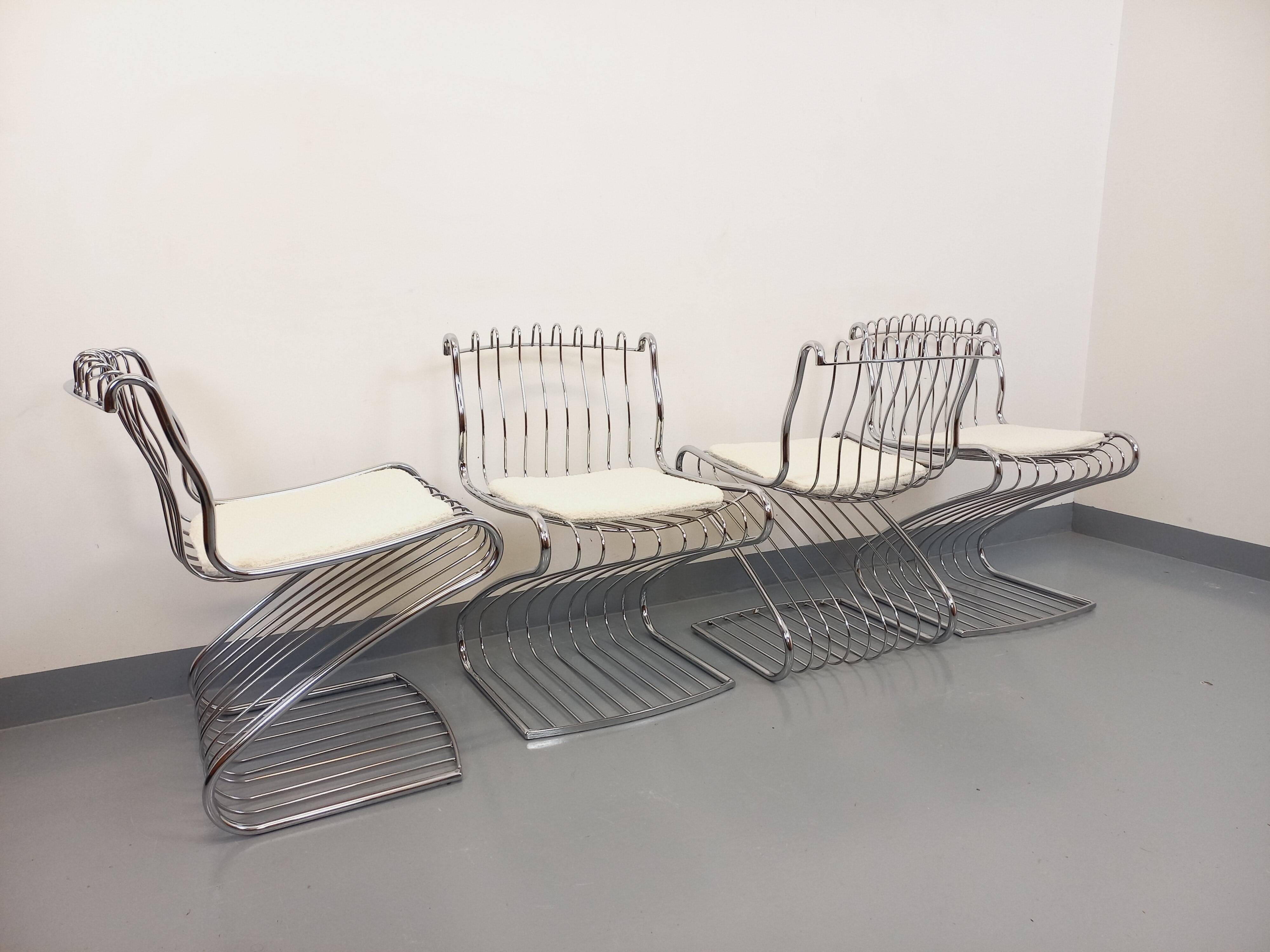 Set of 4 vintage Italian chairs by Gastone Rinaldi in chrome metal.