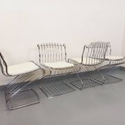 Set of 4 vintage Italian chairs by Gastone Rinaldi in chrome metal.