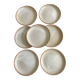 7 stoneware plates 1970