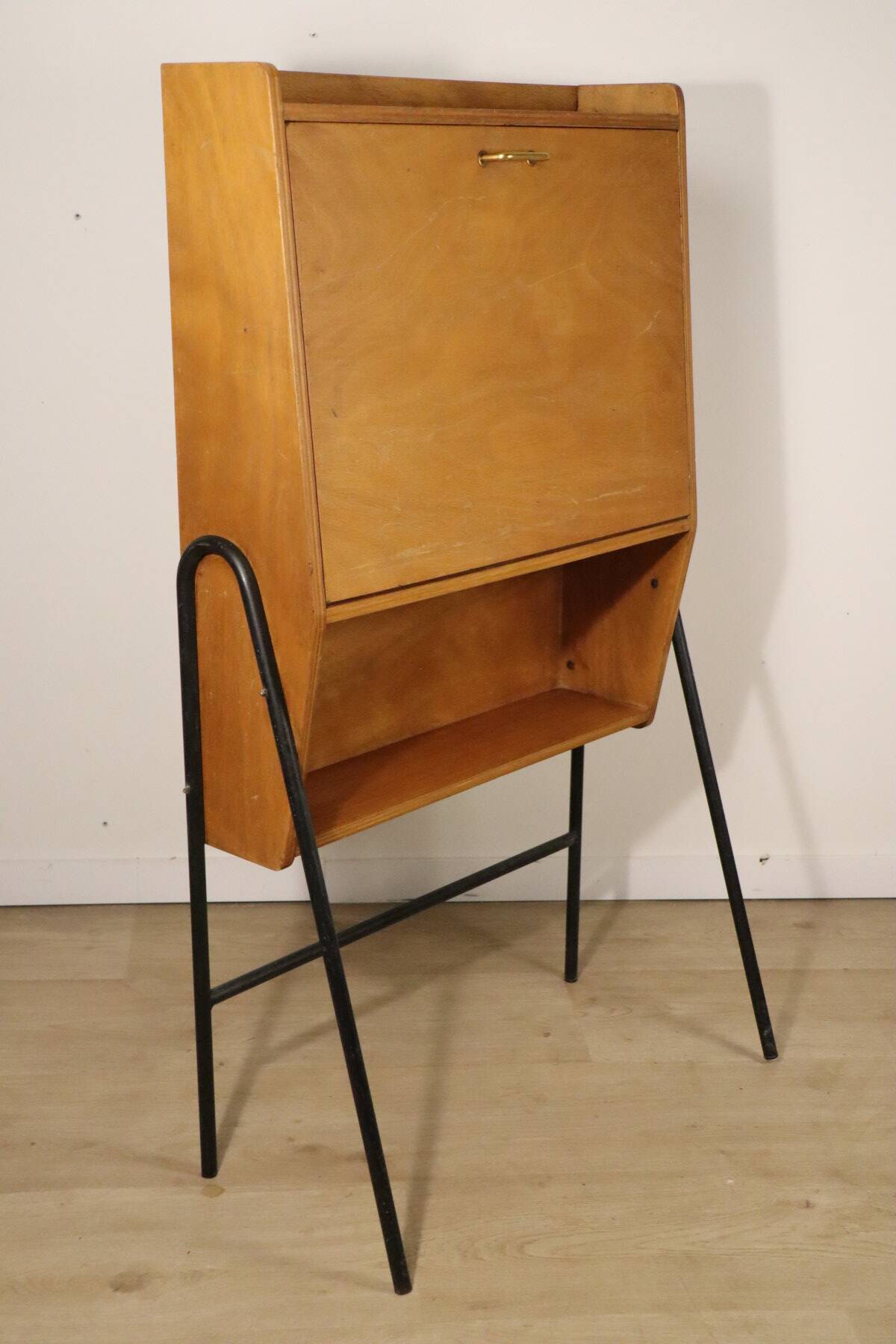 Vintage 1960s wooden secretary with metal legs.