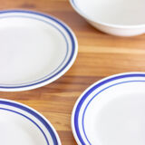 4 blue bordered dessert plates and a matching bowl