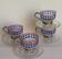Four vintage coffee cups screen printed glass and metal