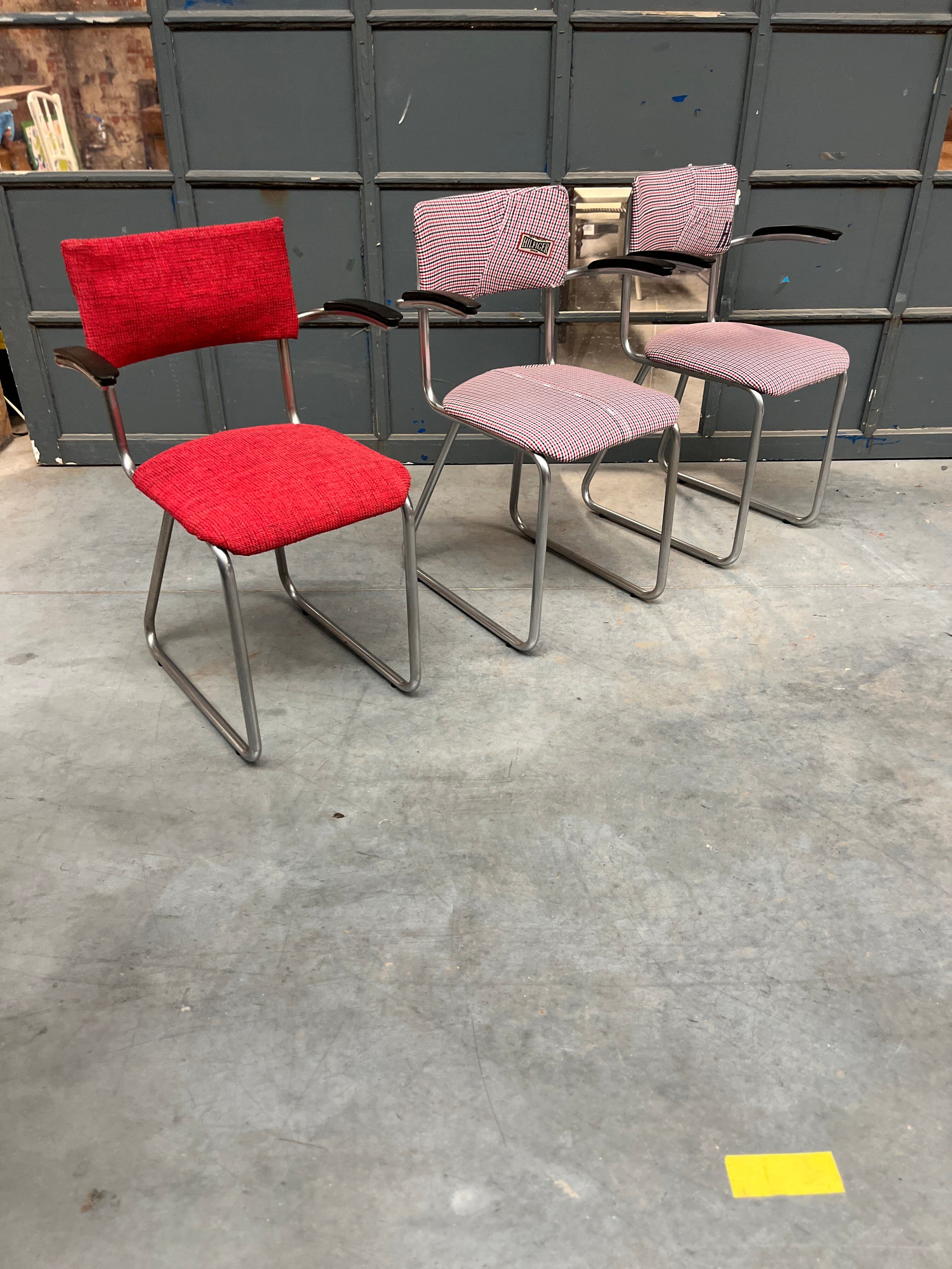 Set of 3 vintage cantilever chairs reupholstered.