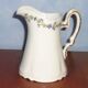 Pitcher in Limoges porcelain, barbel decoration
