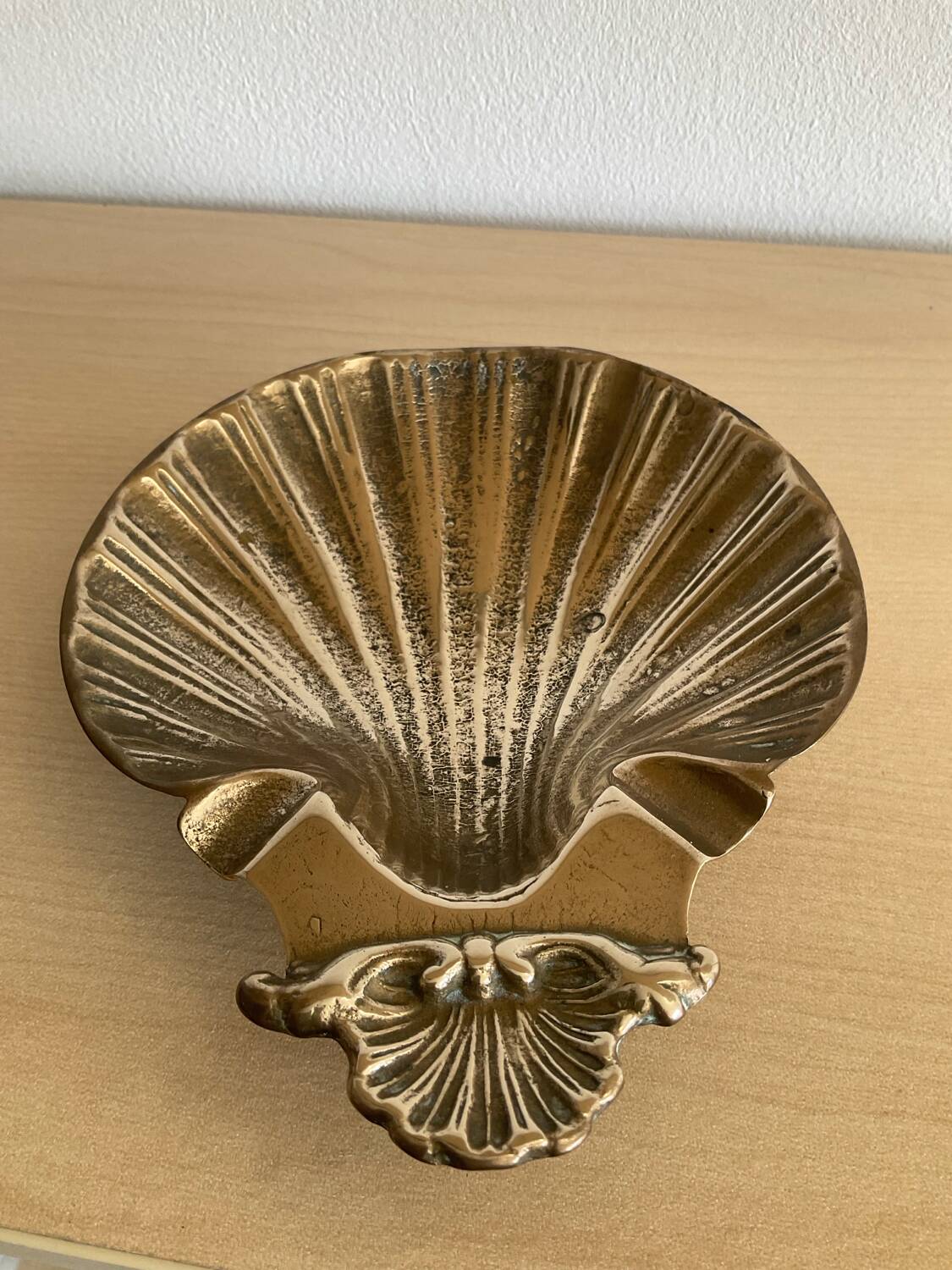 Vintage bronze shell emptier