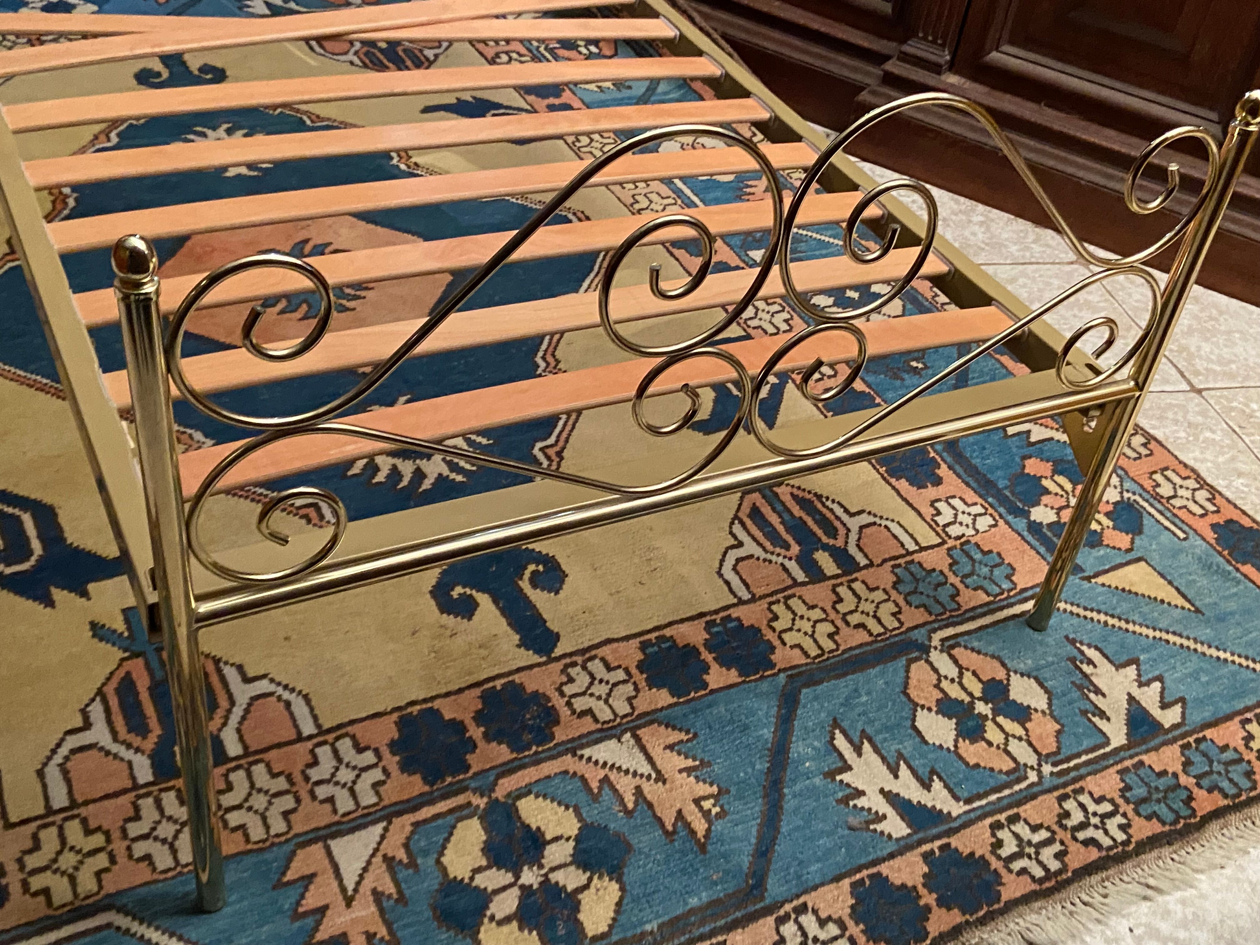 Romantic style single bed in brass with bedside table