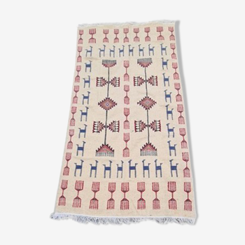 Beige kilim carpet with multicolored patterns handmade in pure wool