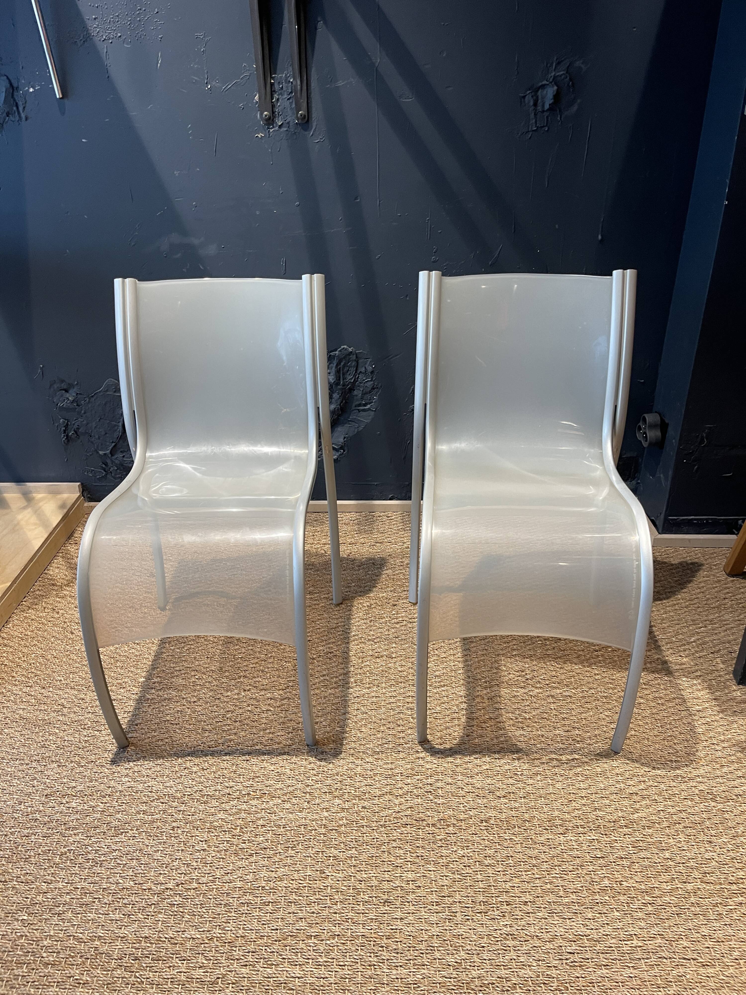 Pair of fpe chairs by ron arad for kartell translucent gray italy