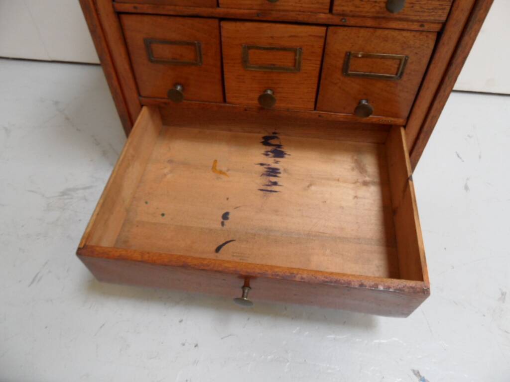 Antique oak watchmakers cabinet with drawers