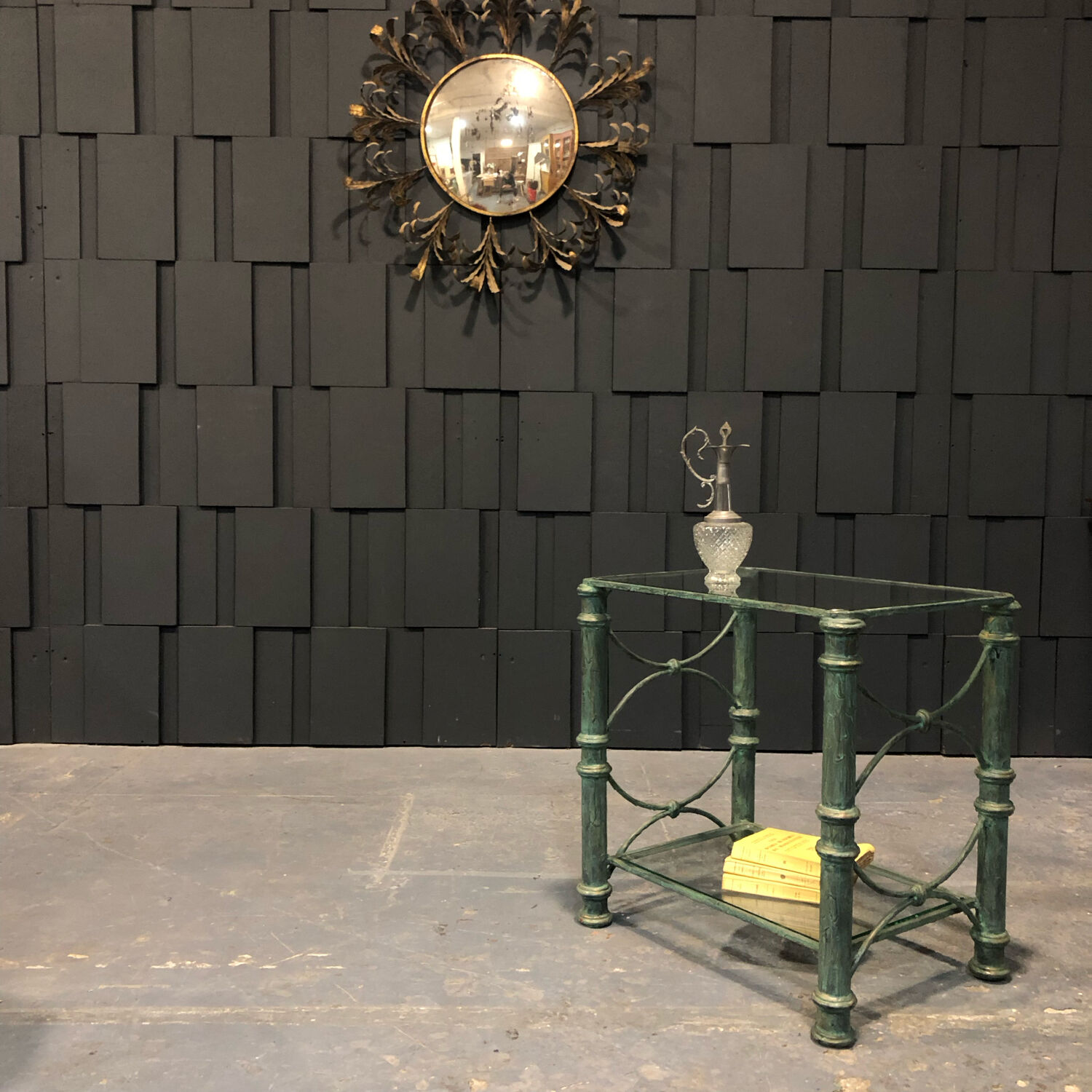 Iron and glass side table with antique patina