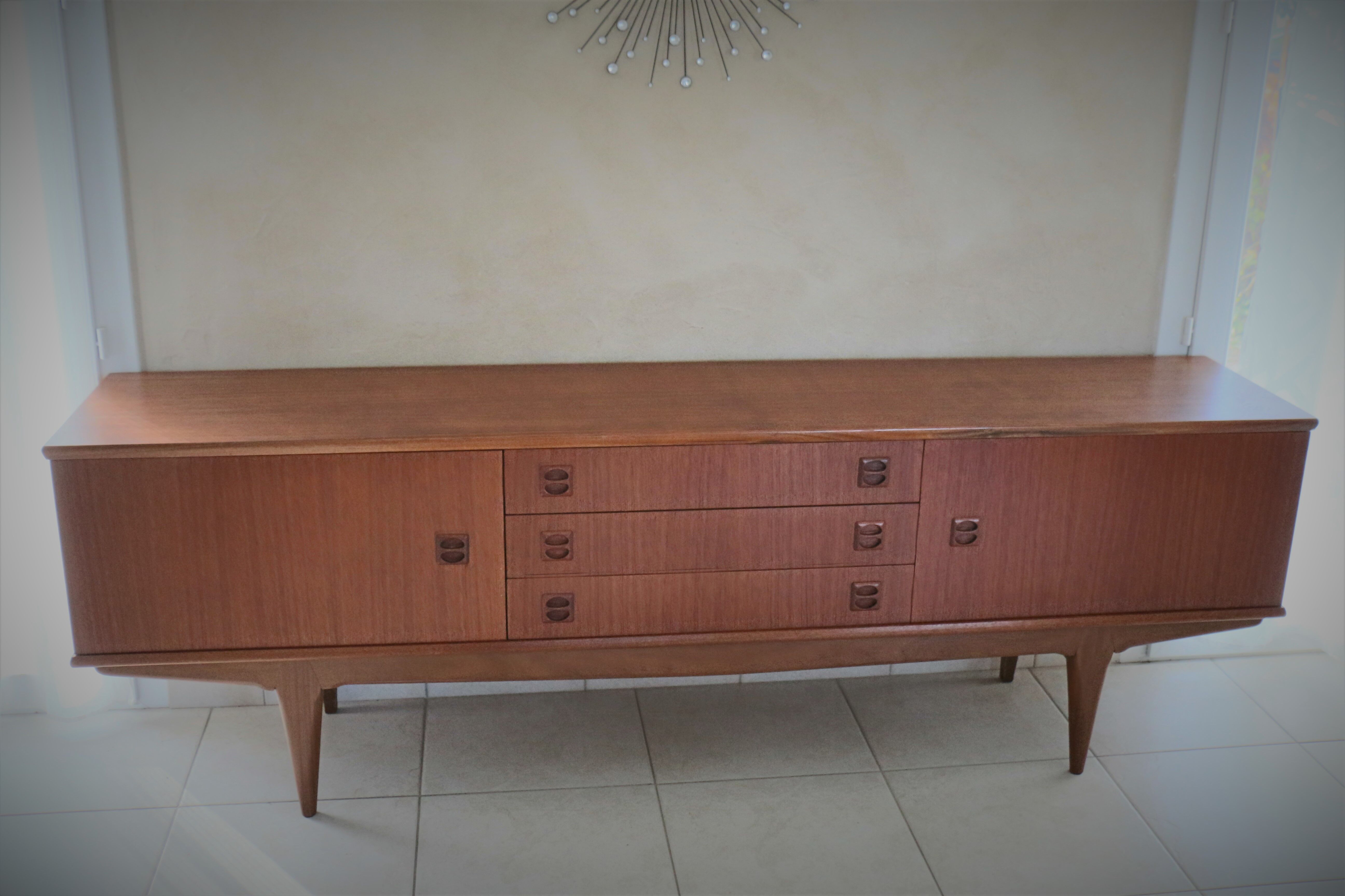 Scandinavian sideboard in teak and teak veneer in the late 60s
