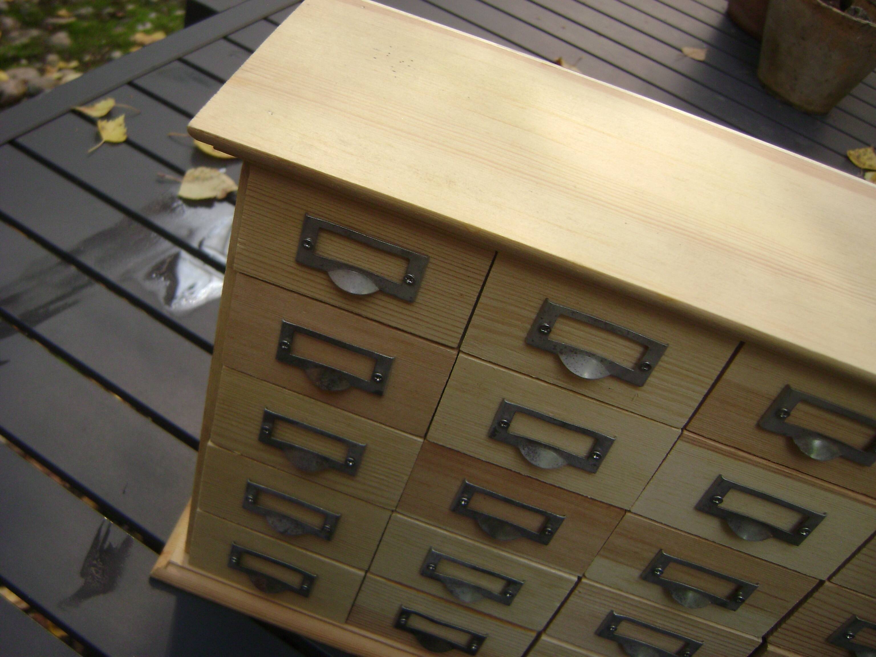 small wooden drawer unit
