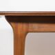 Extendable teak dining table in Mid-Century style from McIntosh, UK.