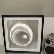 a Kinetic Op Art Aluchromy under glass frame.