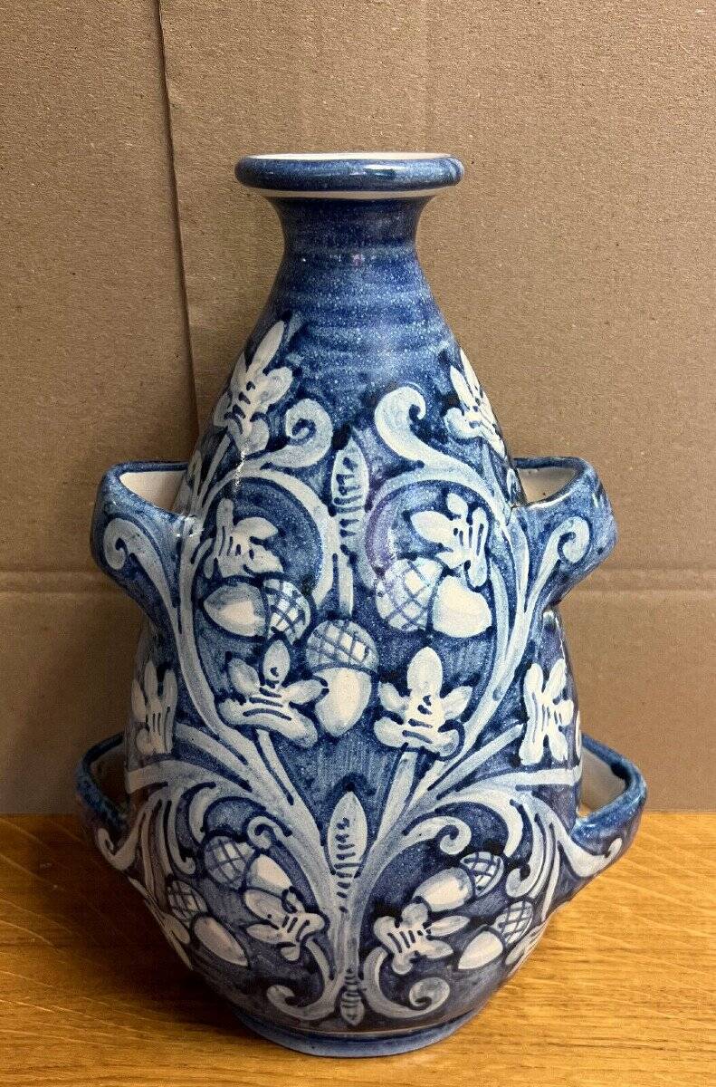 blue and white glazed earthenware vase circa 1900