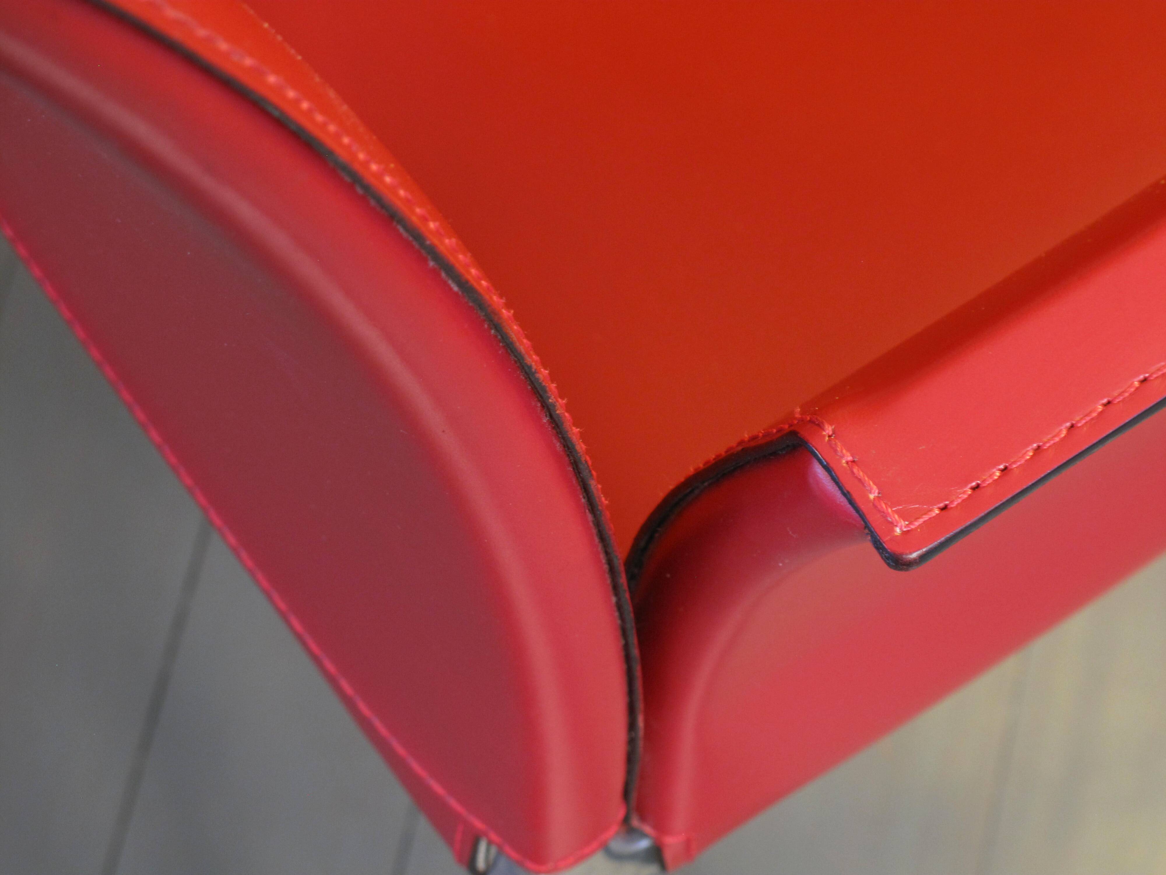 Set of 4 Zanotta armchairs in red leather