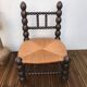 Chaise basse paillée