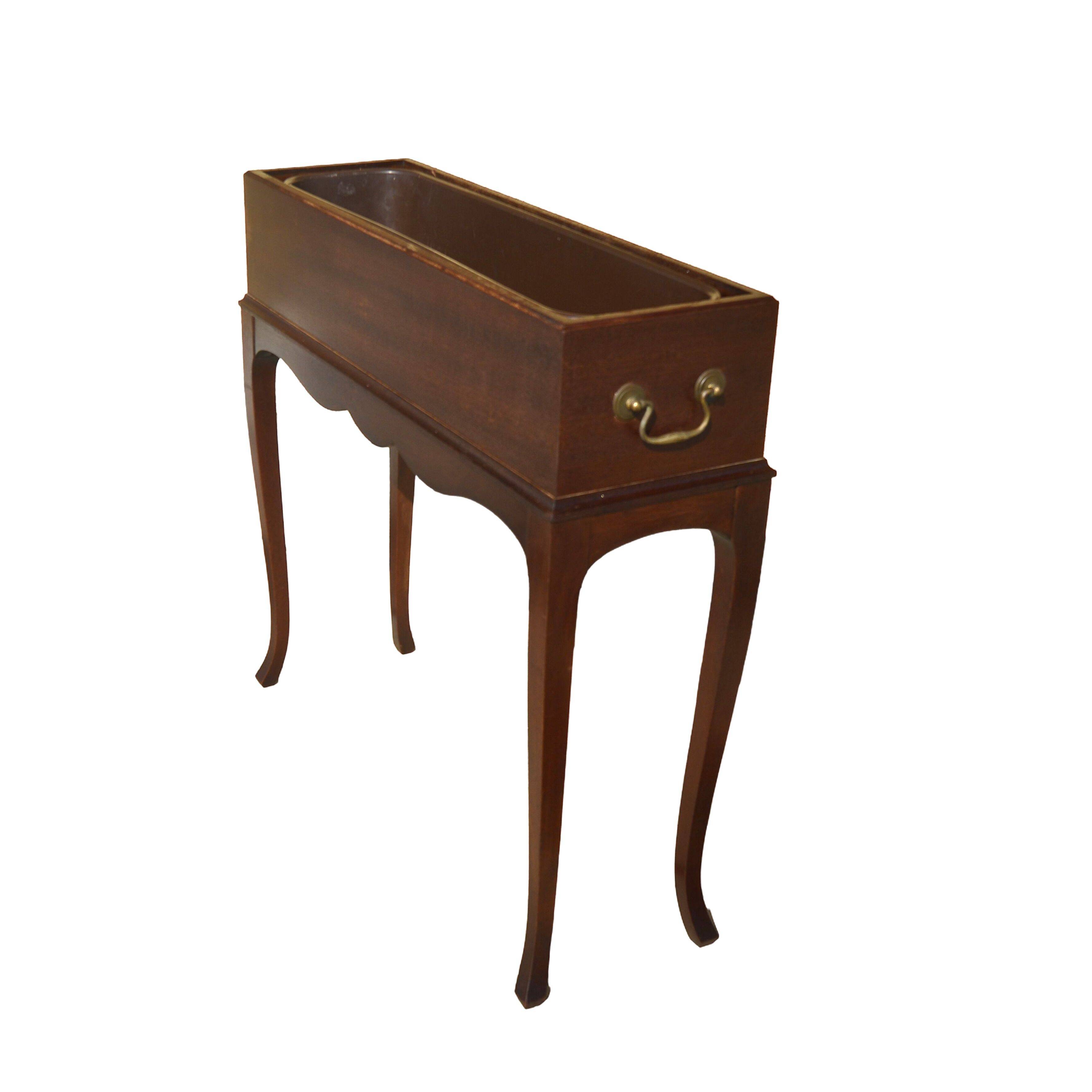 Elegant mid-century teak planter with tray.