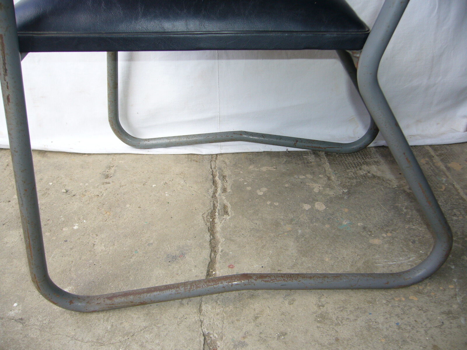 Old industrial chair in skai and metal