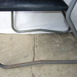 Old industrial chair in skai and metal