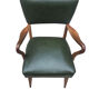 Fauteuil bas  en skaï vert bouteille