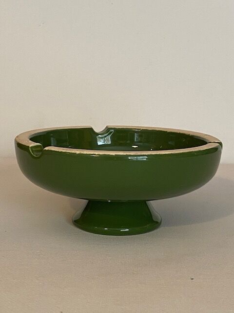 Vintage green ashtray on foot