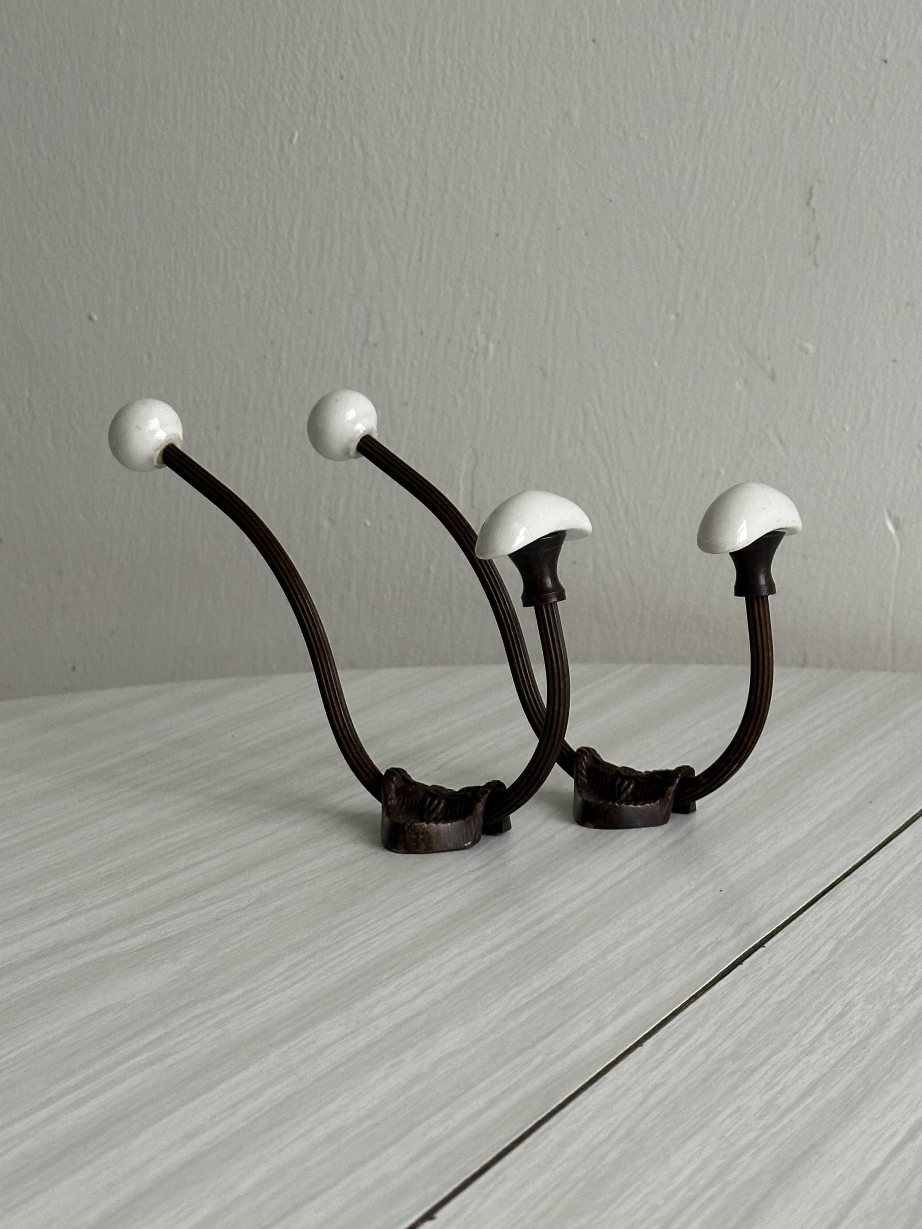 set of 2 metal and porcelain ceramic hooks