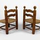 Pair of low straw chairs  circa 1940