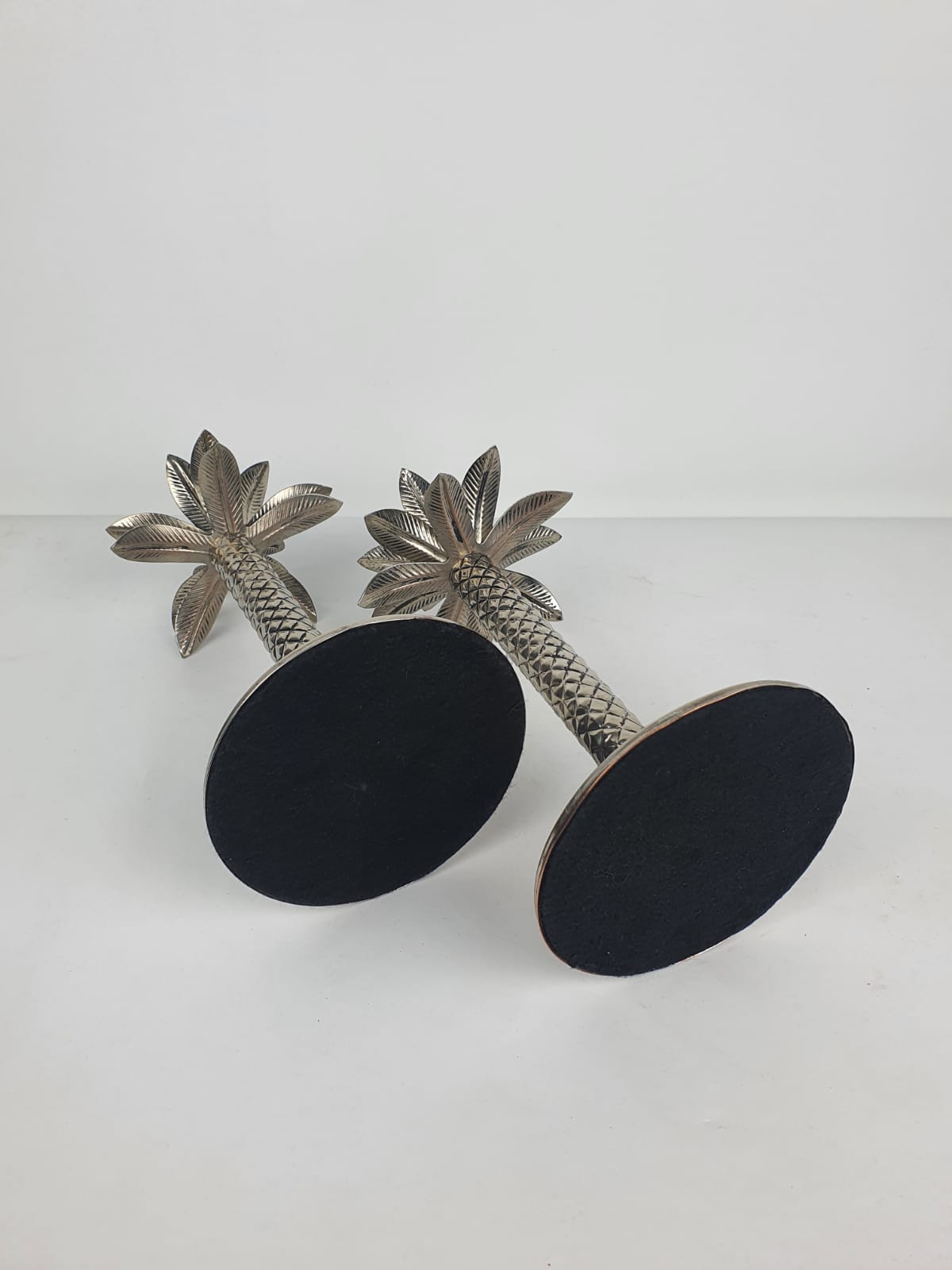 Pair of Palmtree design candle holders
