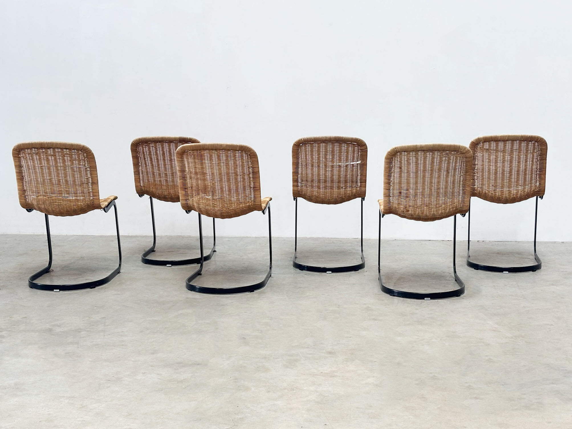 Set of six Cidue rattan dining chairs