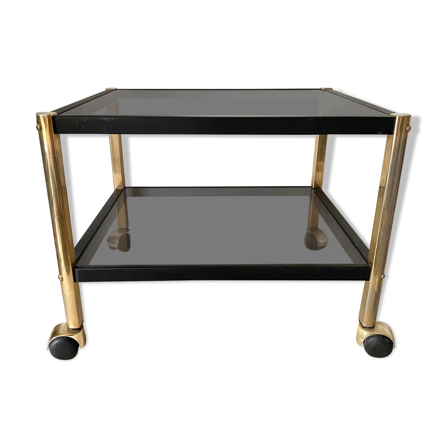 Serving with vintage wheels in metal and smoked glass