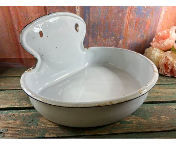 Old white enamelled hand washbasin or gardener enamel garden