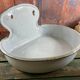 Old white enamelled hand washbasin or gardener enamel garden