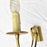 Vintage golden color sconce with twisted bulb candle