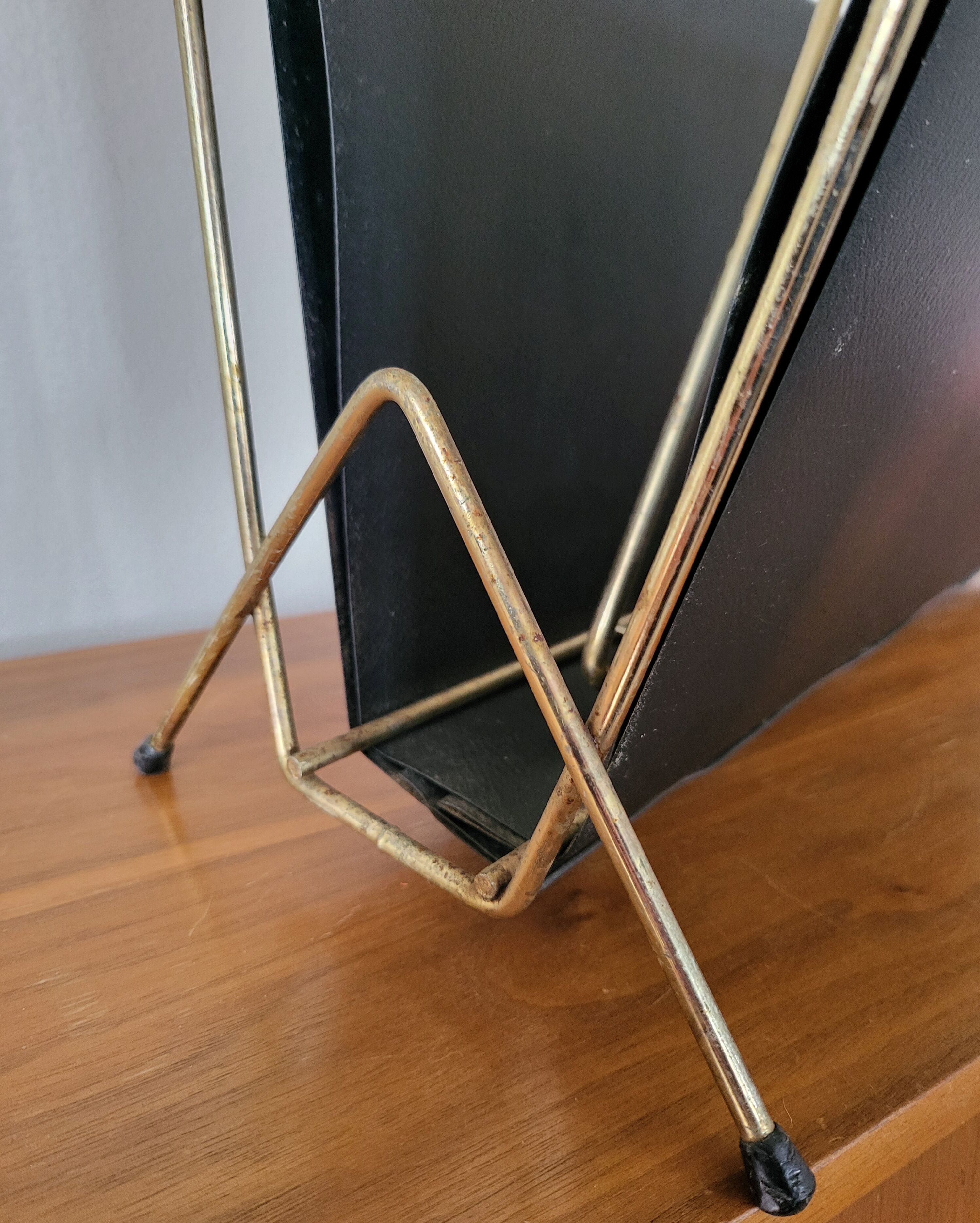Vintage metal magazine rack in gold and black vinyl Newspaper holder