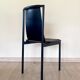 4 postmodern design chairs in black metal and leather, 1980's