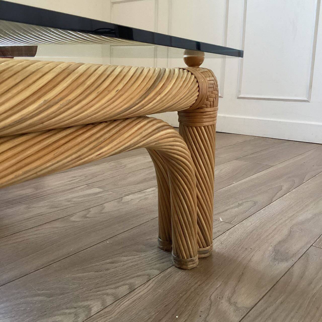 Large rattan and glass coffee table