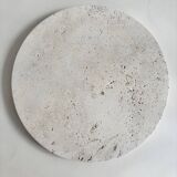 Circular flat travertine pocket emptier