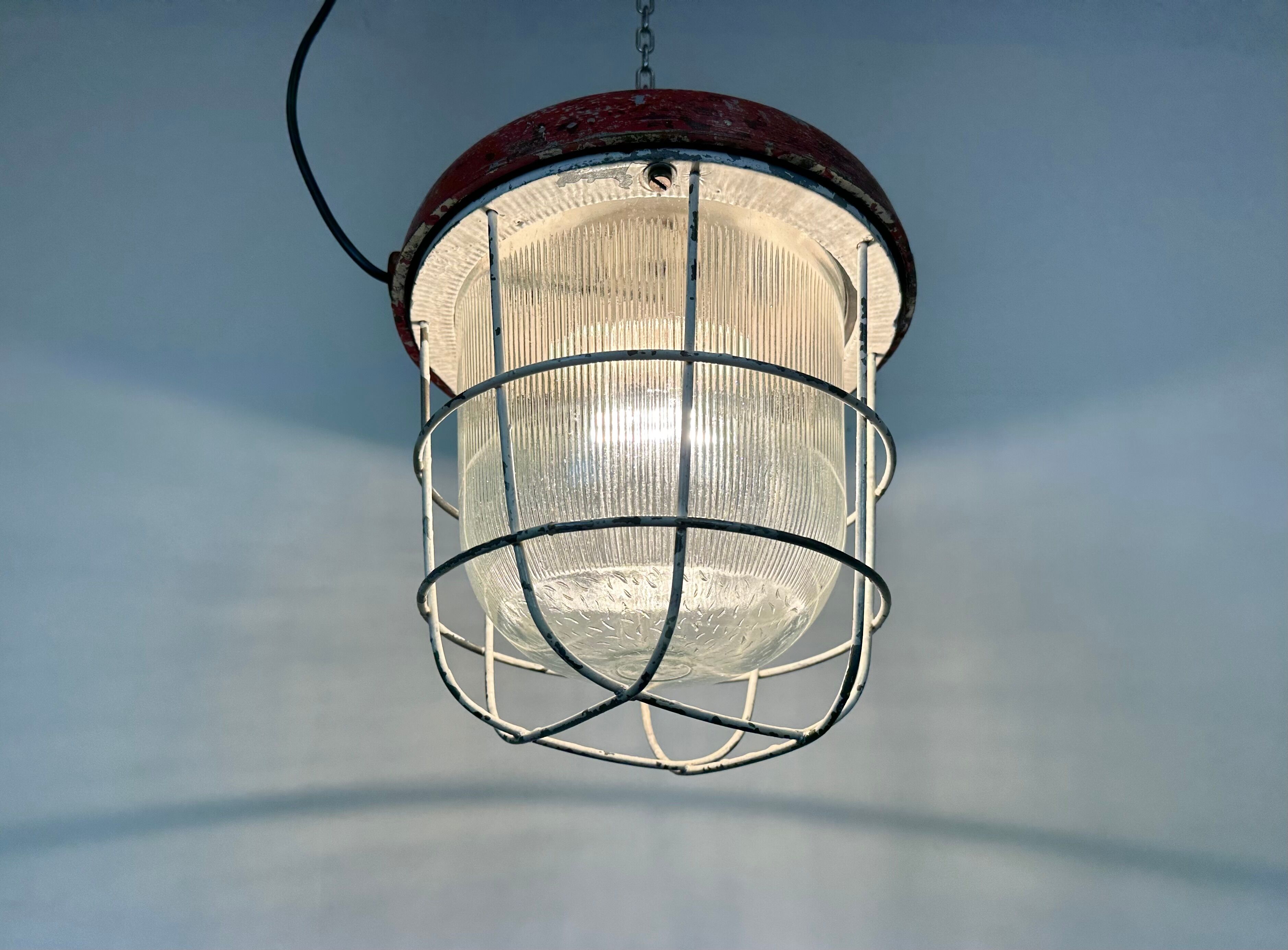 Red industrial cast iron cage pendant light, 1960s