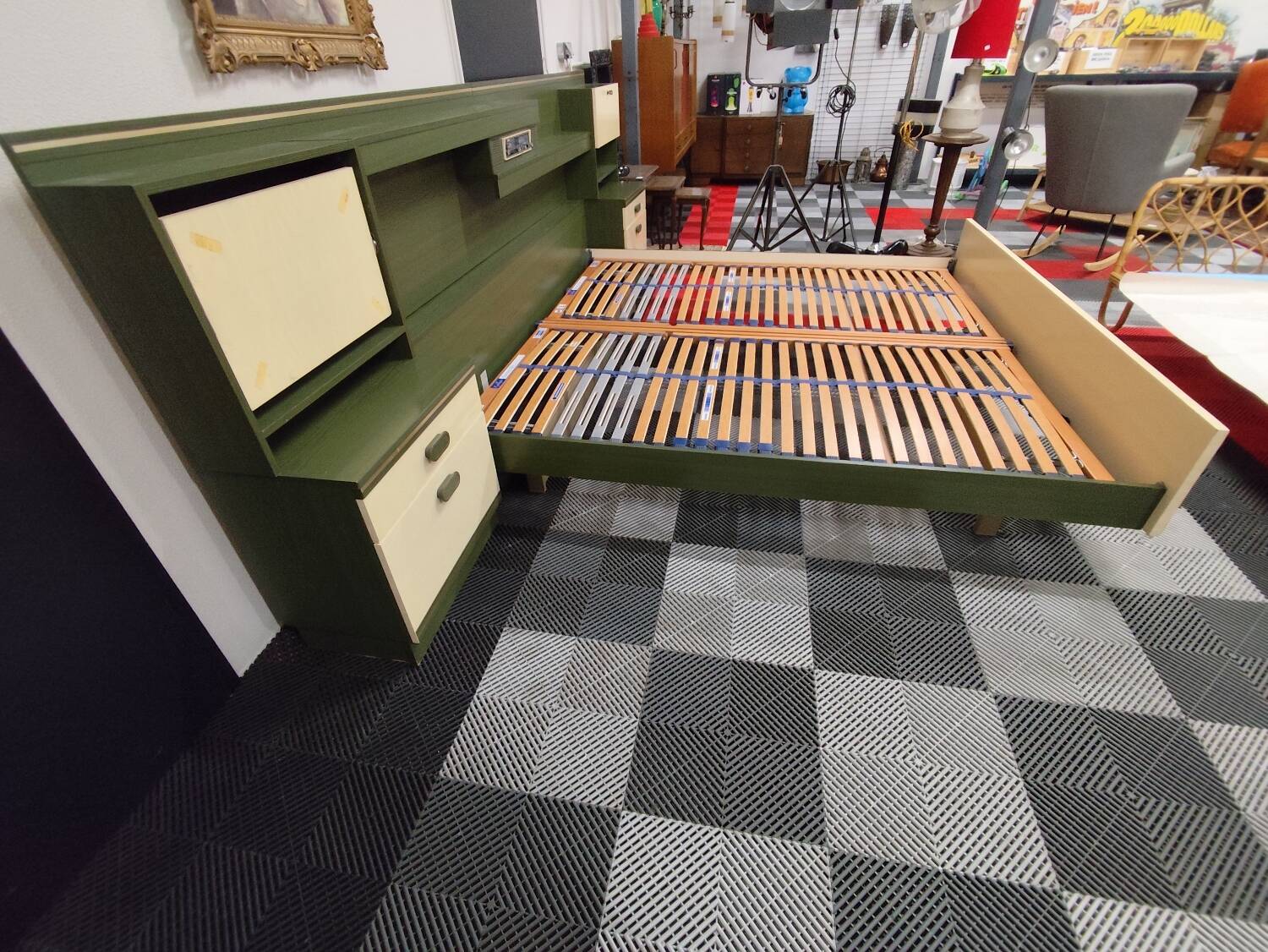 Vintage king-size bed with headboard furniture and built-in radio.